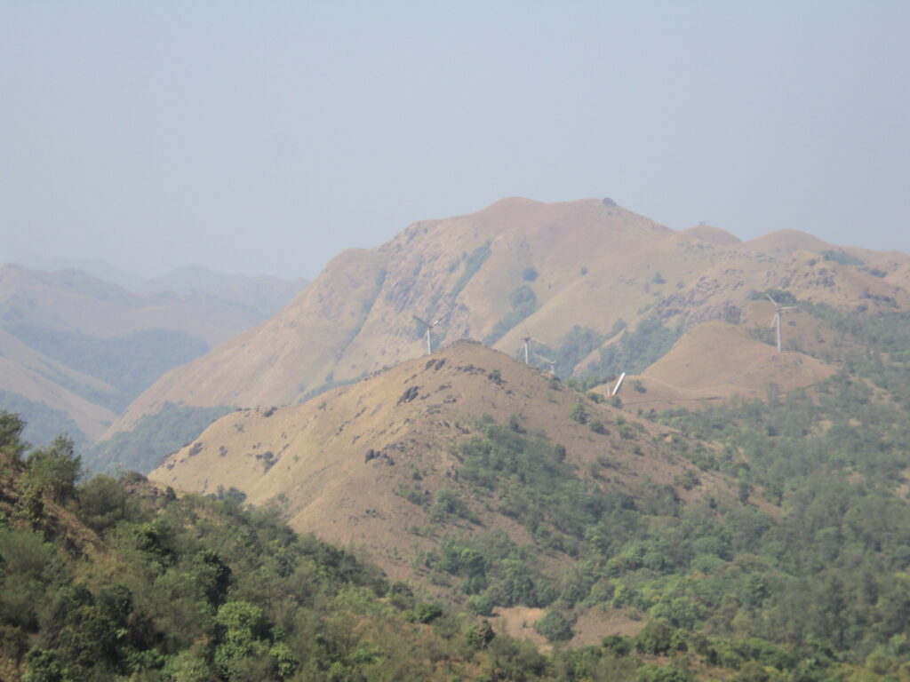 Talacauvery temple complex surrounded by misty hills in Coorg