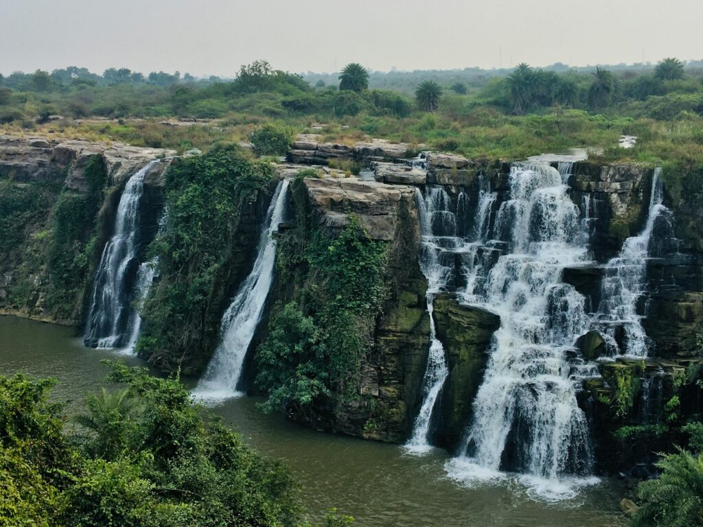 Abbey Falls waterfall surrounded by lush coffee plantations in Coorg