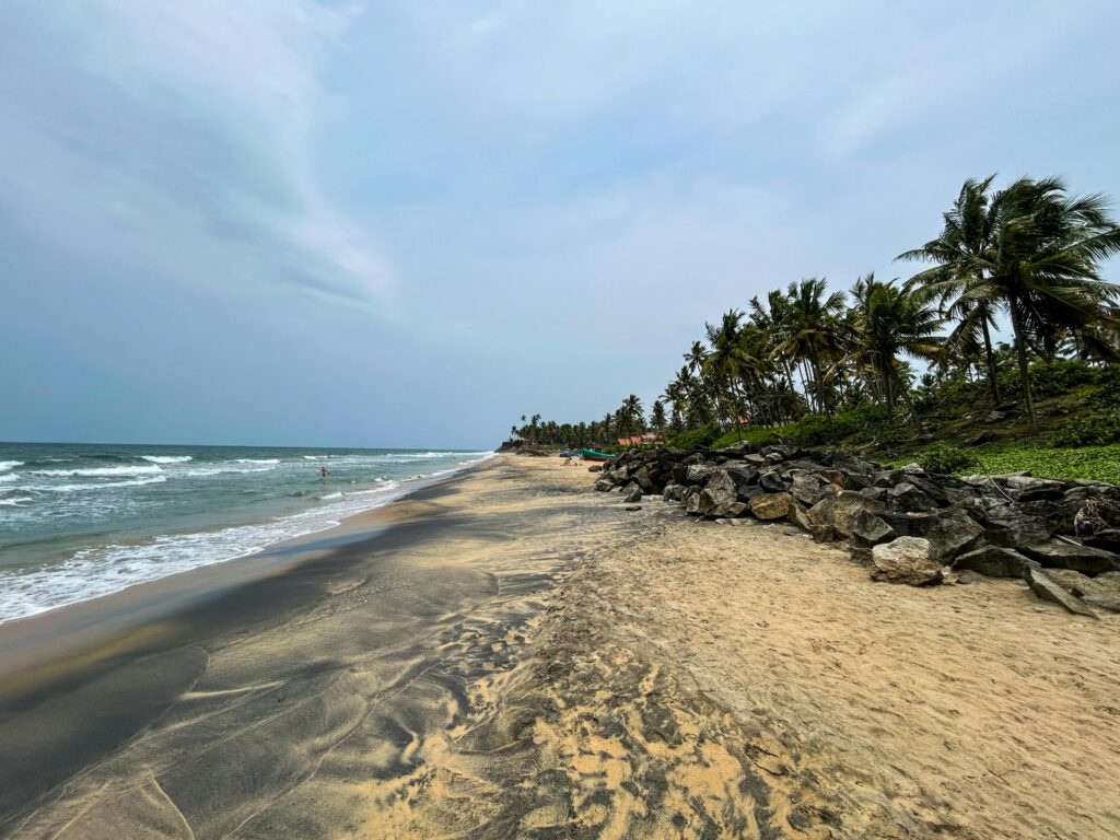 Backwaters meeting the sea at Kappil Beach near Varkala