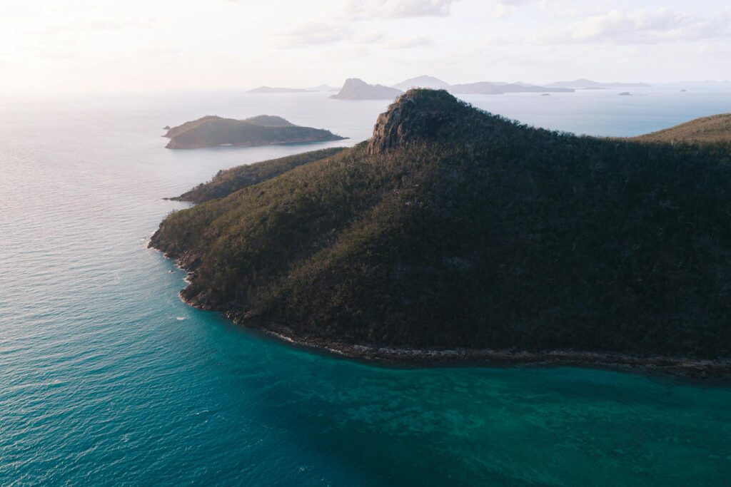 Turquoise waters and pristine white sand of Whitehaven Beach in the Whitsunday Islands, Australia. A perfect travel destination for island getaways.