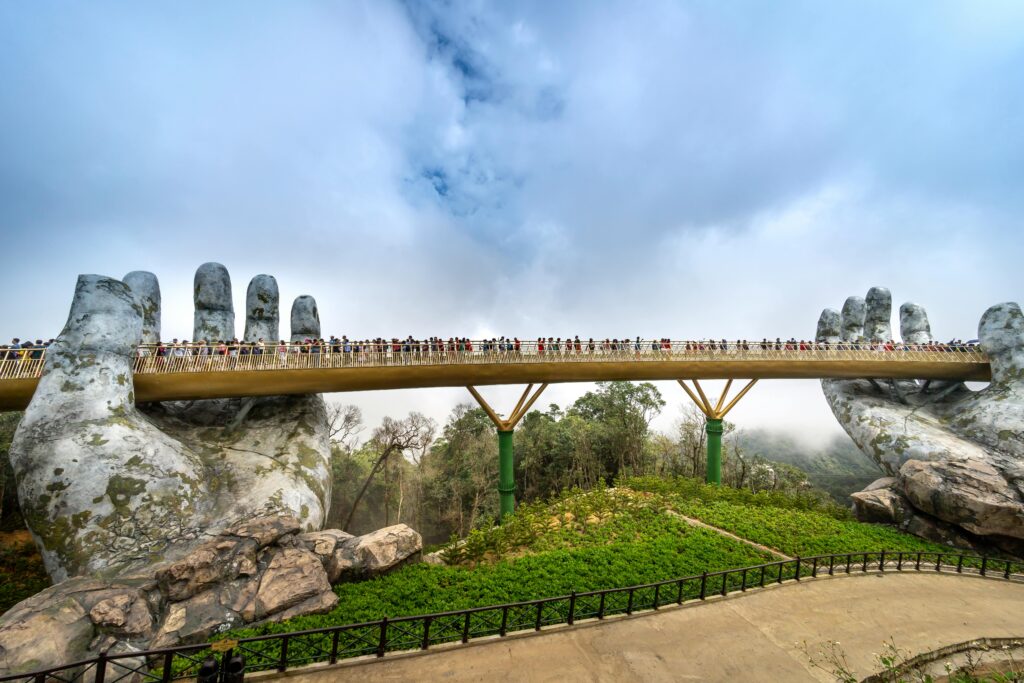 The Golden Bridge in Vietnam is a pedestrian bridge in the Bà Nà Hills resort that's held up by two giant hands.