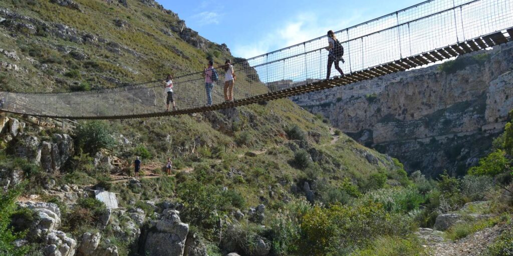 Suspension bridge over Gravina gorge near Mater
