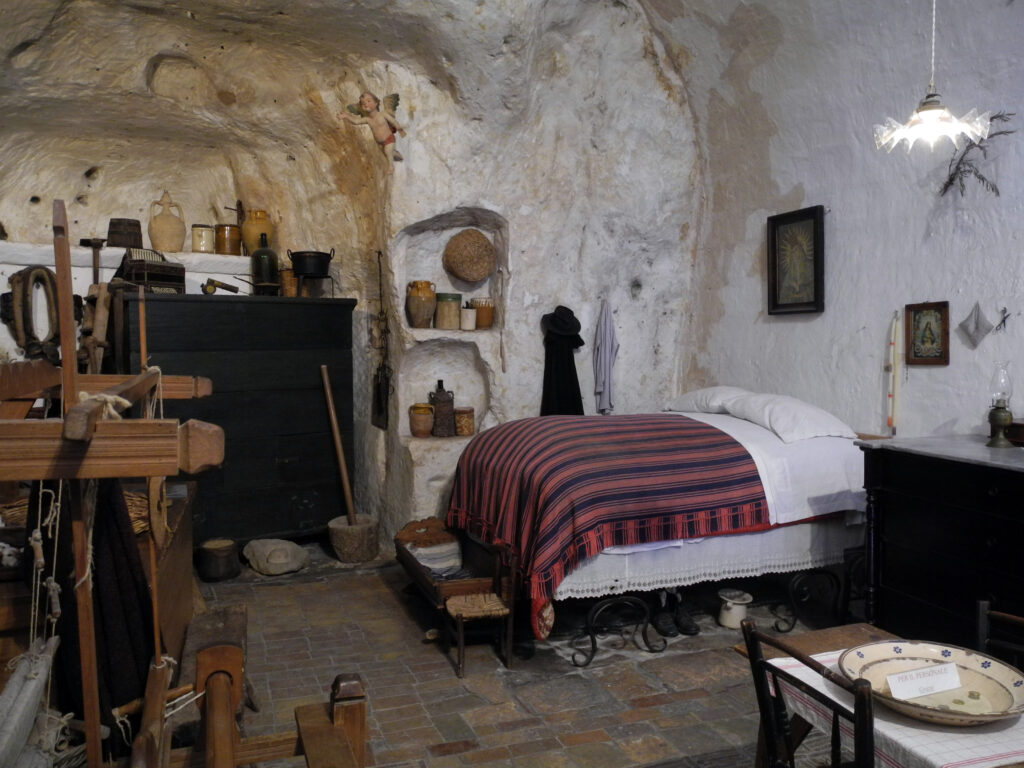 Casa Grotta di Vico Solitario, Historical site featuring a recreated cave dwelling with period furnishings, tools & artifacts.