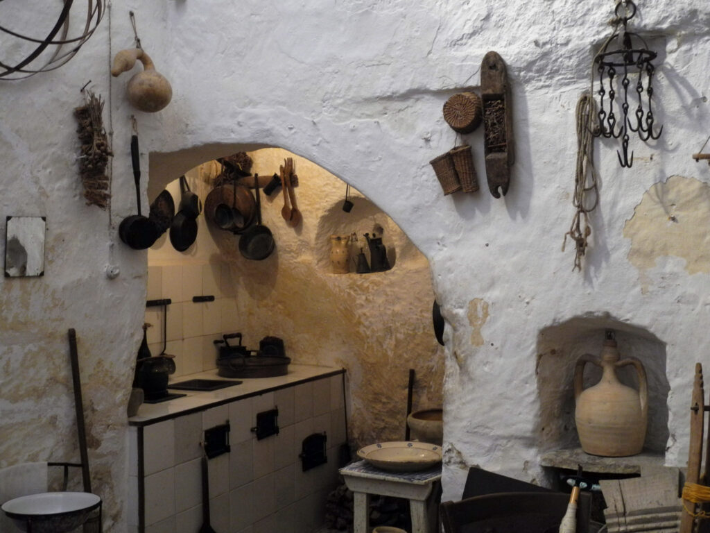 Casa Grotta di Vico Solitario, Historical site featuring a recreated cave dwelling with period furnishings, tools & artifacts.