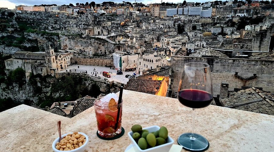 Dining with a panoramic view of Matera’s cave city in Italy