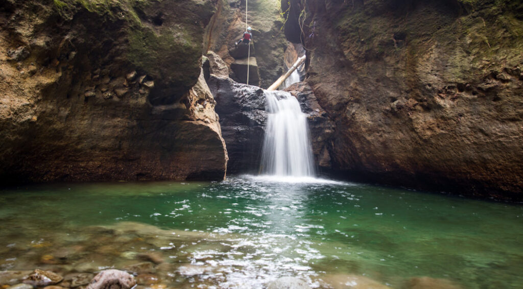 Natural pool at waterfall Dominica