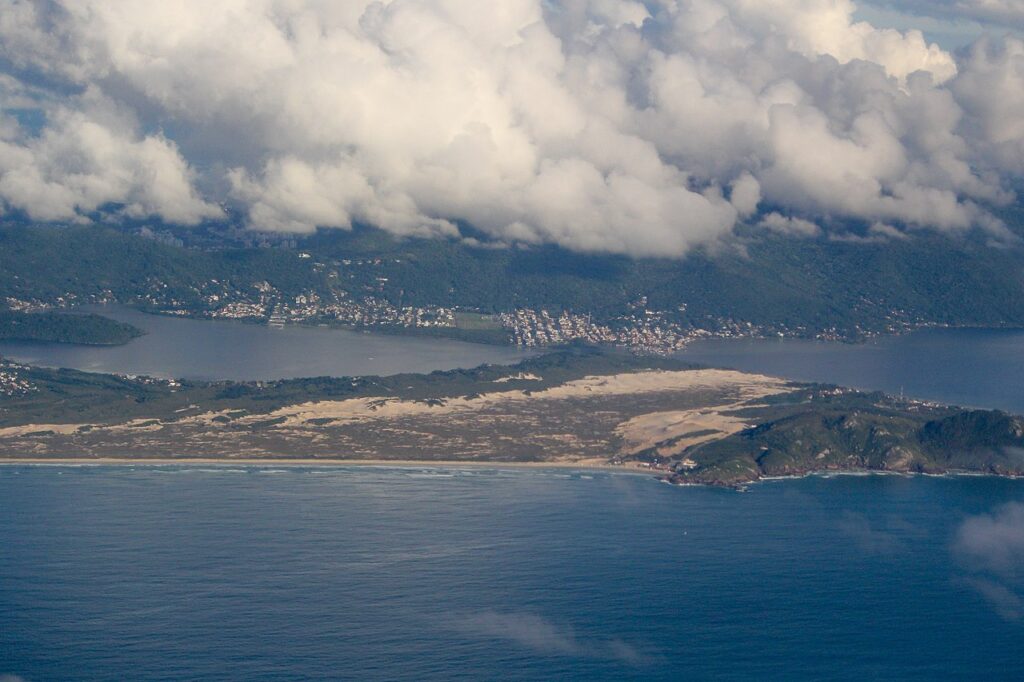 Lagoa da Conceição: Massive saltwater lagoon perfect for kitesurfing, SUP, and sunset views. The village has great restaurants, cafes, and nightlife.