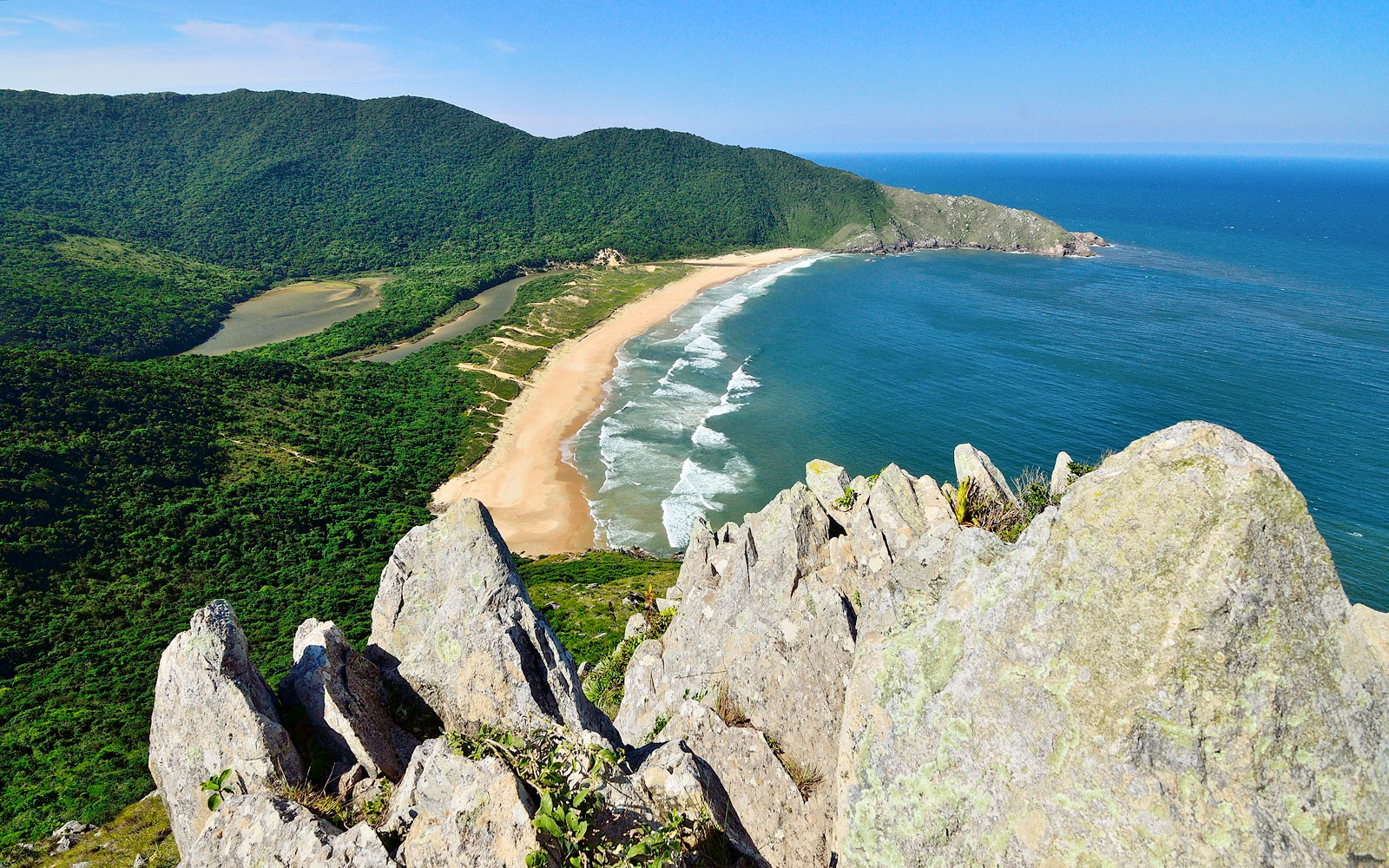 Pristine beach and lagoon of Lagoinha do Leste, nestling between forested hills in Florianópolis