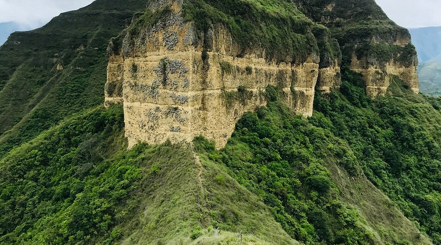 Hikers on Mandango mountain trail near Vilcabamba Ecuador