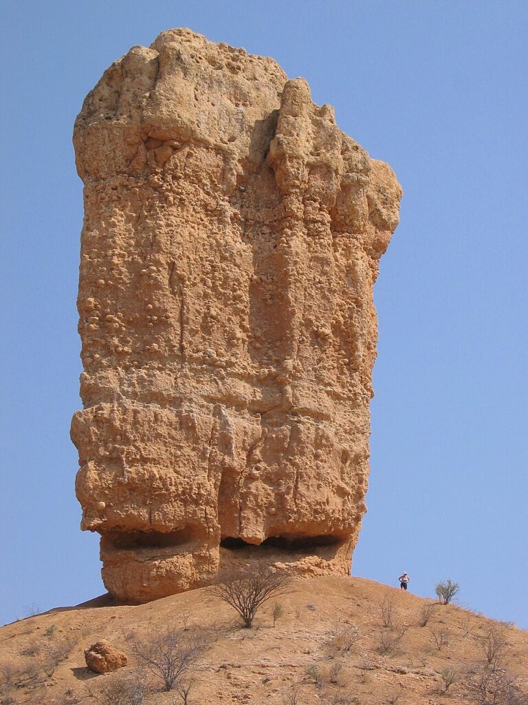 Vingerklip (Finger Rock): A 35-meter limestone pillar stands alone on a plateau like nature's exclamation point.
