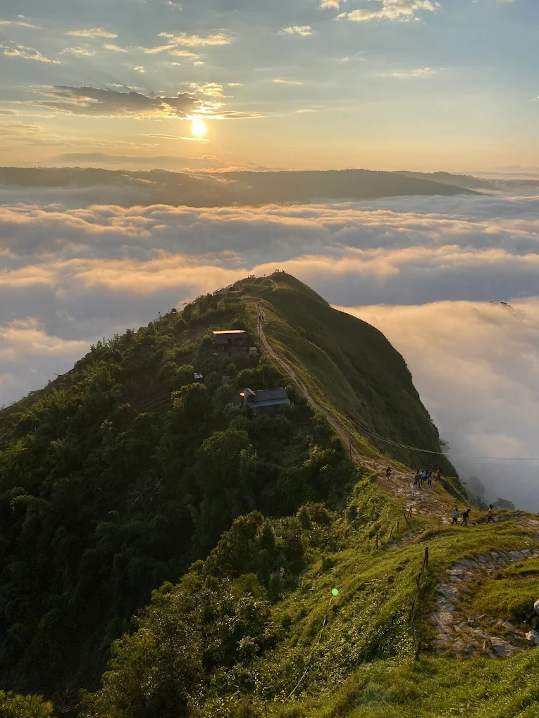The Nongjrong Falls trek is a moderate 3-4 kilometer round trip through forest paths