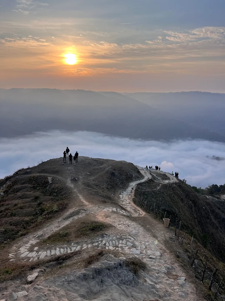 Sunrise over lush green hills in northeast India travel landscape