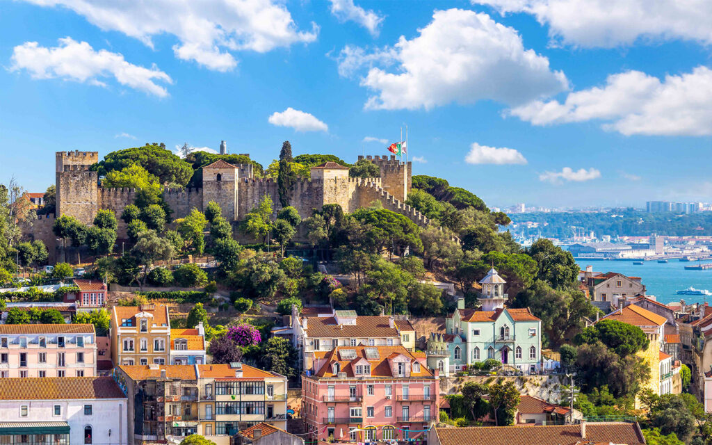 Alfama historic district Lisbon cobblestone alley Portugal