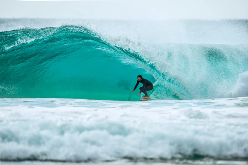 Surfing at Martha Lavinia Beach, Kind Island, Tasmania, Australia