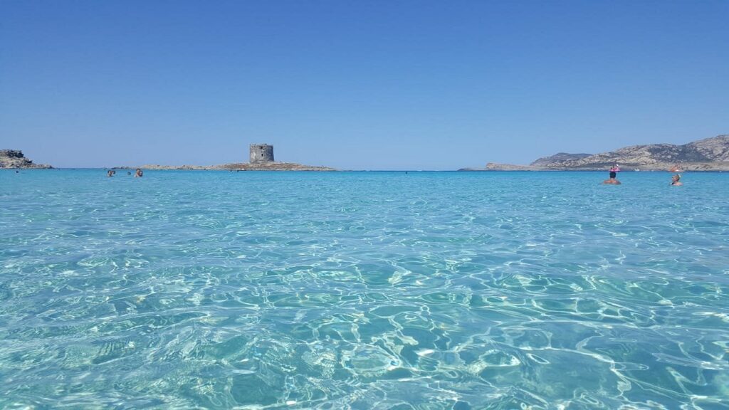 La Pelosa (near Stintino) — blindingly white sand, shallow water, perfect for families